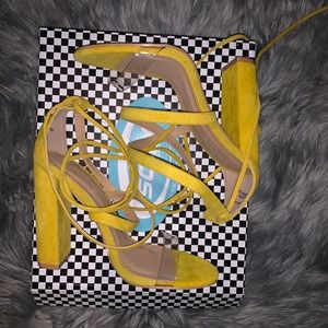 Yellow strappy heels